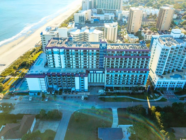 aerial view with a view of the beach and a water view