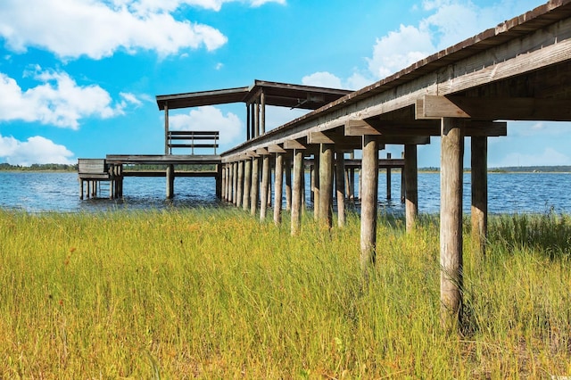 view of dock with a water view