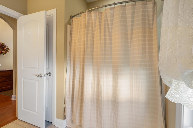 bathroom with tile patterned floors