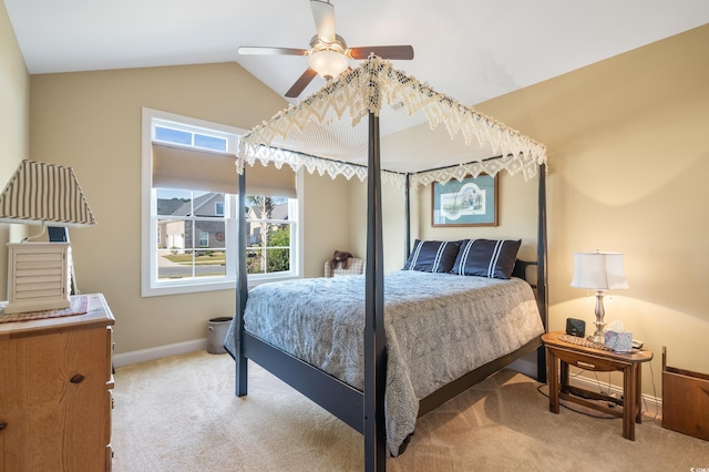 carpeted bedroom featuring ceiling fan and lofted ceiling