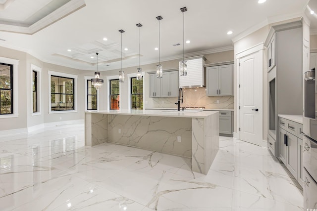 kitchen featuring gray cabinets, a wealth of natural light, and crown molding