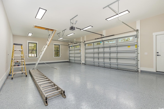 garage featuring a garage door opener