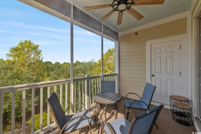 sunroom / solarium with ceiling fan