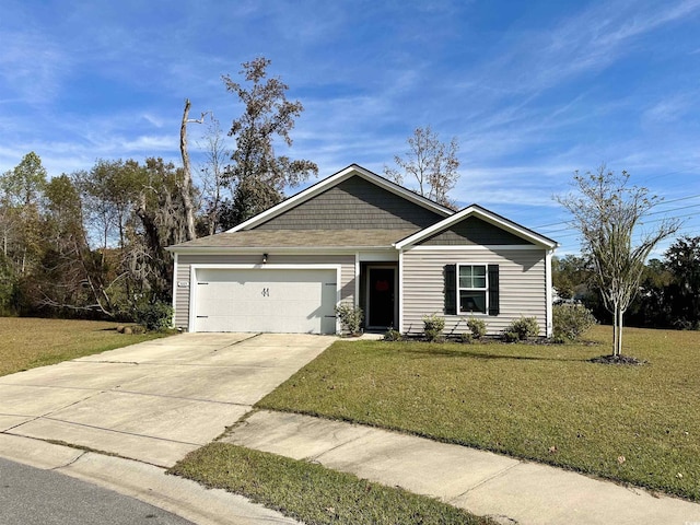 view of front of home featuring a garage and a front lawn