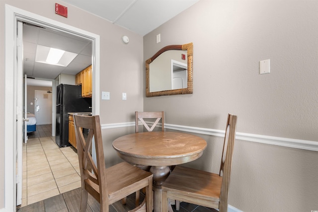 view of tiled dining space