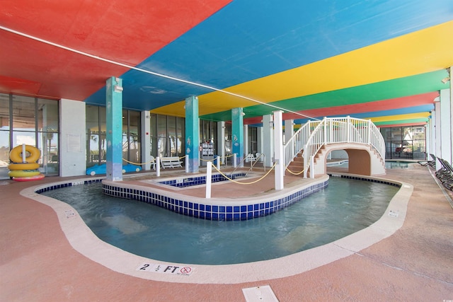 view of pool featuring a patio area