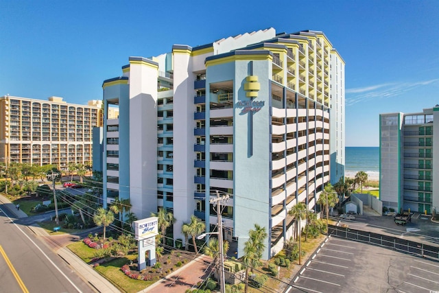 view of building exterior with a water view