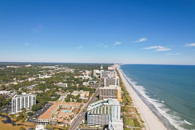 bird's eye view featuring a view of the beach and a water view