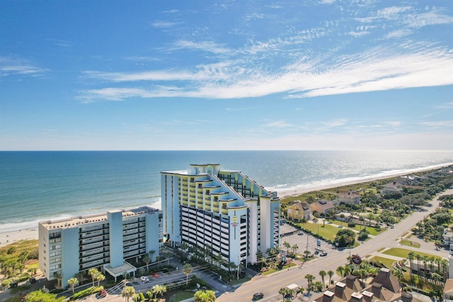 bird's eye view featuring a beach view and a water view