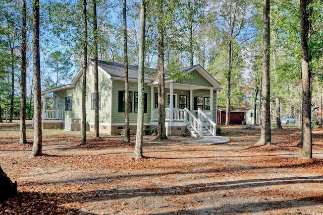 1409 Woodhaven Rd, Latta, SC 29565 - view of front of property featuring crawl space and a porch