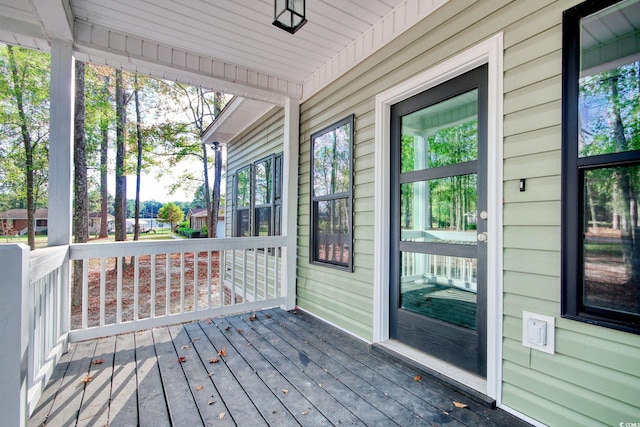 wooden deck featuring a porch