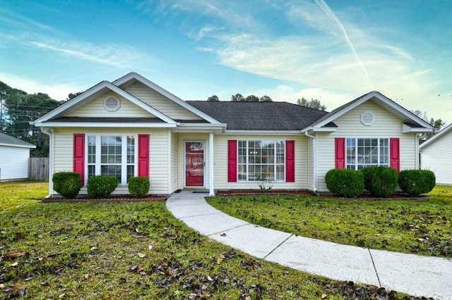 ranch-style home with a front yard