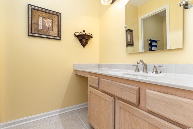 bathroom with tile patterned flooring and vanity