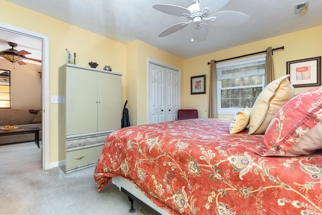 carpeted bedroom featuring ceiling fan