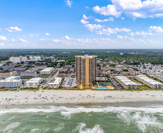 bird's eye view featuring a beach view and a water view