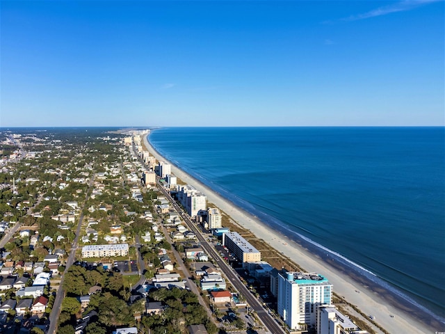 aerial view featuring a view of the beach and a water view