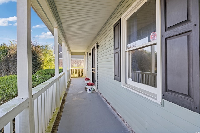 balcony featuring a porch