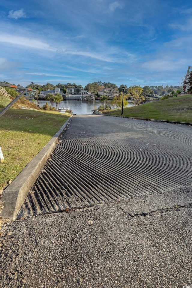 view of road featuring a water view