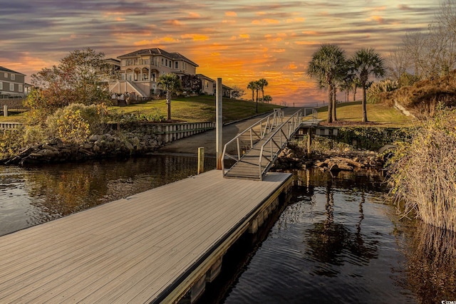 dock area featuring a water view