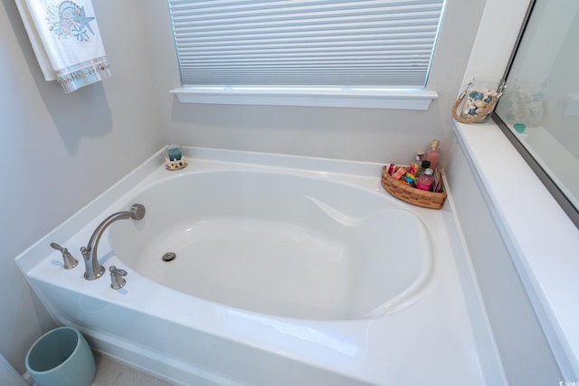 bathroom featuring a bath