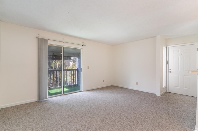 spare room with carpet flooring