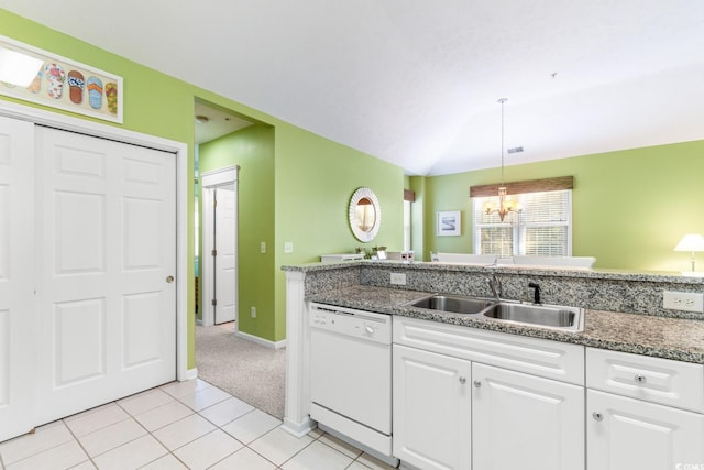 kitchen featuring light carpet, white dishwasher, sink, a notable chandelier, and white cabinets