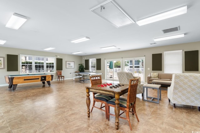 dining space featuring pool table and french doors