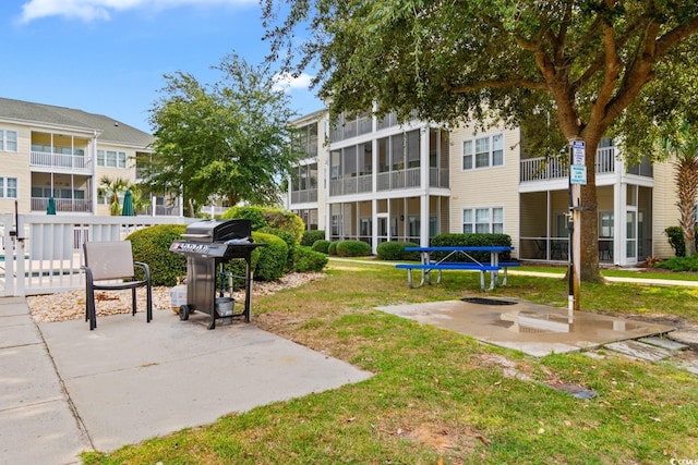 surrounding community featuring a lawn