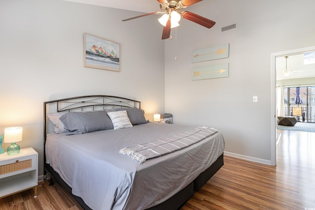 bedroom with ceiling fan and hardwood / wood-style flooring