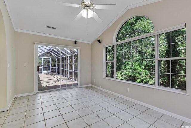 unfurnished room featuring light tile patterned floors, crown molding, ceiling fan, and lofted ceiling