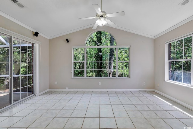 tiled empty room with ceiling fan, crown molding, and vaulted ceiling