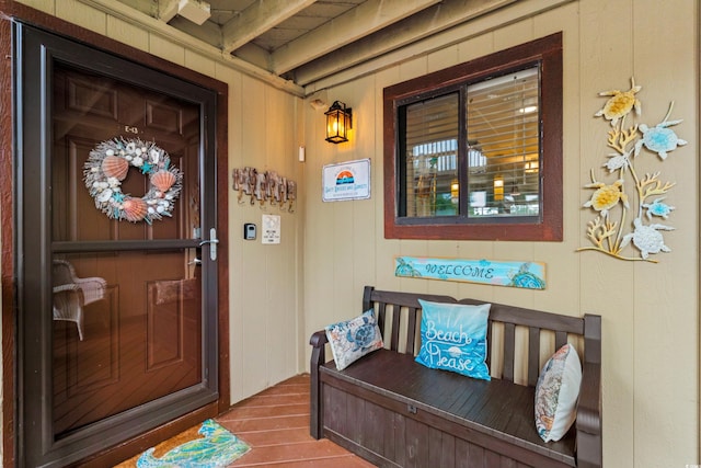 property entrance with covered porch