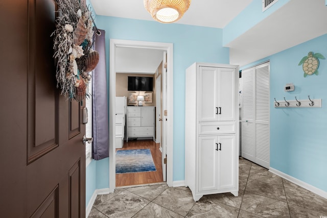 hall featuring hardwood / wood-style floors