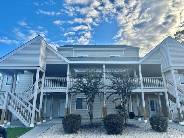 1095 W Plantation Dr Unit 28-I, Little River, SC 29566 - multi unit property featuring stairs and roof with shingles