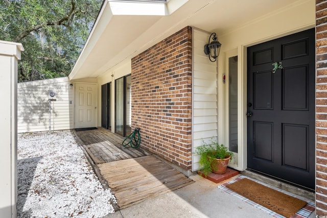 entrance to property with a porch