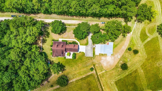 birds eye view of property featuring a rural view