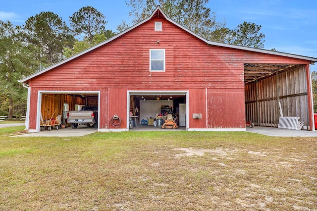 garage with a yard