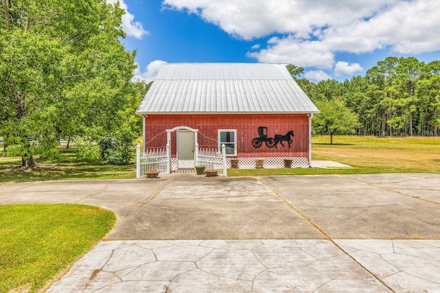 exterior space with a lawn