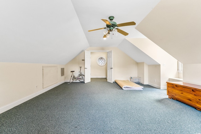 additional living space with carpet floors, vaulted ceiling, and ceiling fan