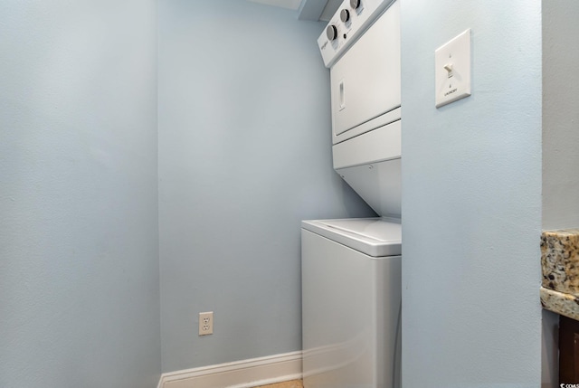 9661 Shore Dr Unit B30, Myrtle Beach, SC 29572 - laundry area featuring stacked washing machine and dryer and baseboards