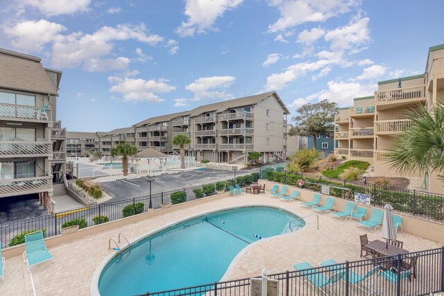 view of pool featuring a patio