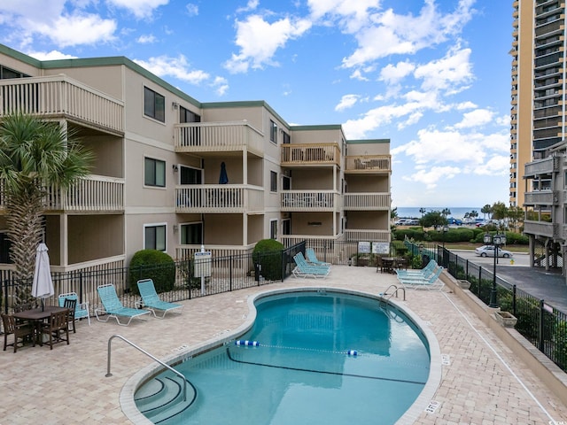 view of pool with a patio