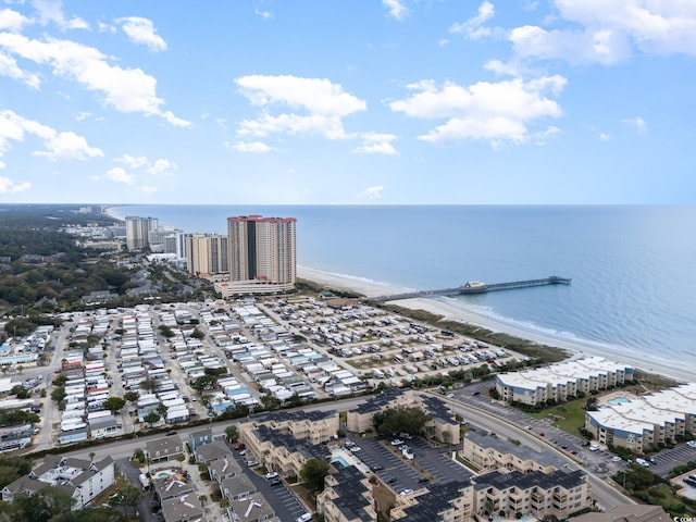 aerial view featuring a water view and a beach view