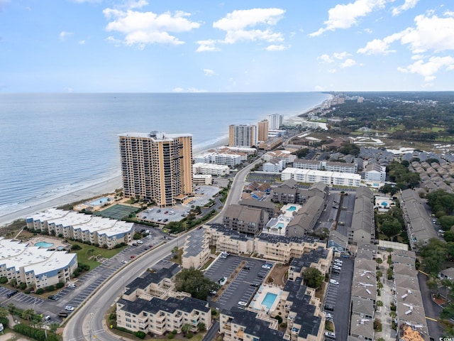 aerial view featuring a water view and a view of the beach