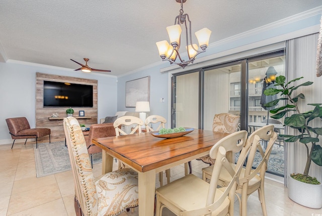 tiled dining area featuring a textured ceiling, ceiling fan with notable chandelier, and crown molding