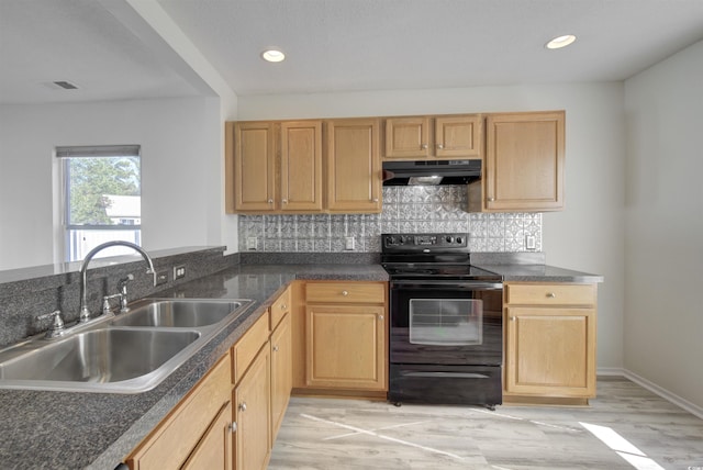 kitchen featuring decorative backsplash, light brown cabinetry, sink, light hardwood / wood-style floors, and black range with electric stovetop