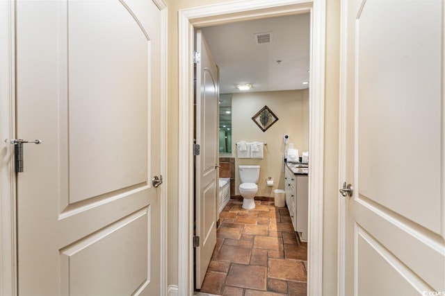 full bathroom featuring vanity, toilet, and bathing tub / shower combination