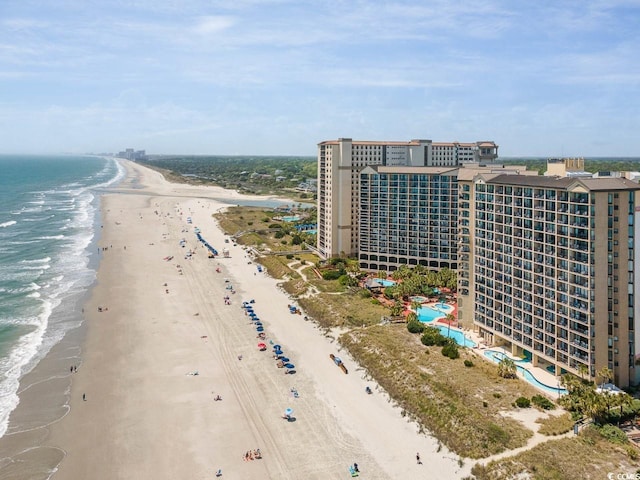 aerial view featuring a water view and a view of the beach