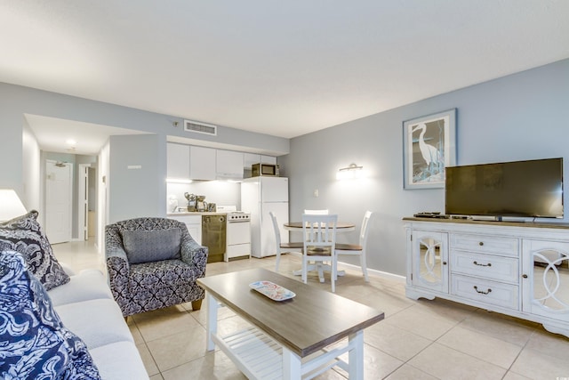 living room featuring light tile patterned flooring