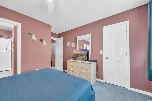 bedroom with carpet flooring, a textured ceiling, and ceiling fan